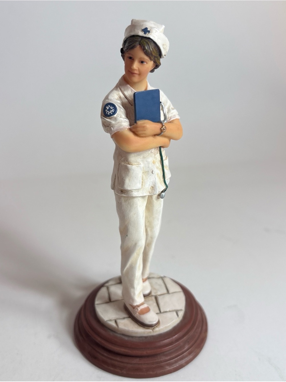 1998 White Caps of Caring "Checkout  Checklist" by Vanmark Nurse Figurine 1/0248